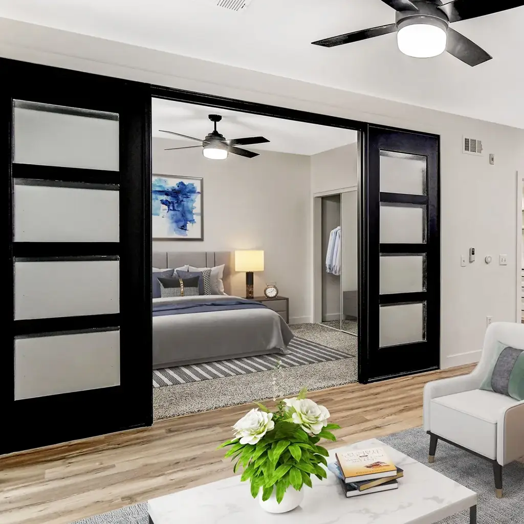 Stout Management Company | Las Vegas Grand Apartments Living Space and Bedroom | Nevada Apartment Operator Thrives